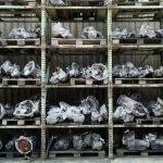 A variety of used parts sitting on a shelf