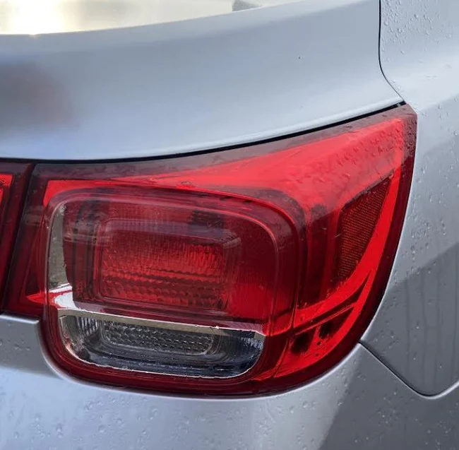 Used OEM RH Taillight fits 2013-2016 Chevrolet Malibu 23294319