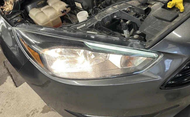 Used OEM RH Headlight fits 2015-2018 Ford Focus F1EZ13008D