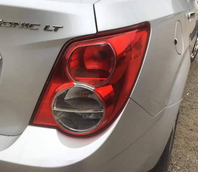 Used OEM RH Taillight fits 2012-2016 Chevrolet Sonic 94534066